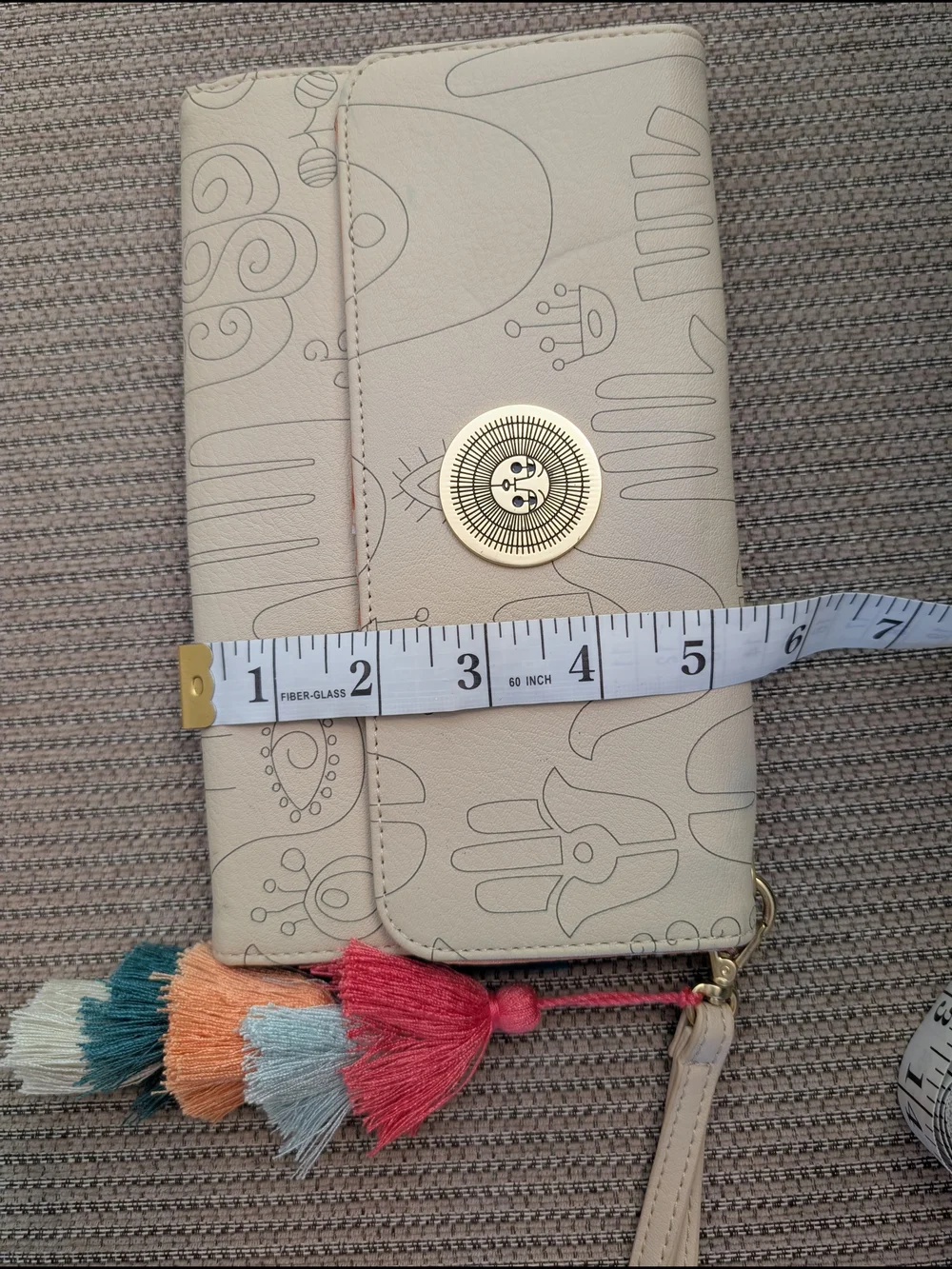 Jungalow Cream Wristlet with Multicolor Tassel Charm